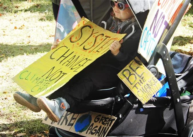 child with a message.jpg