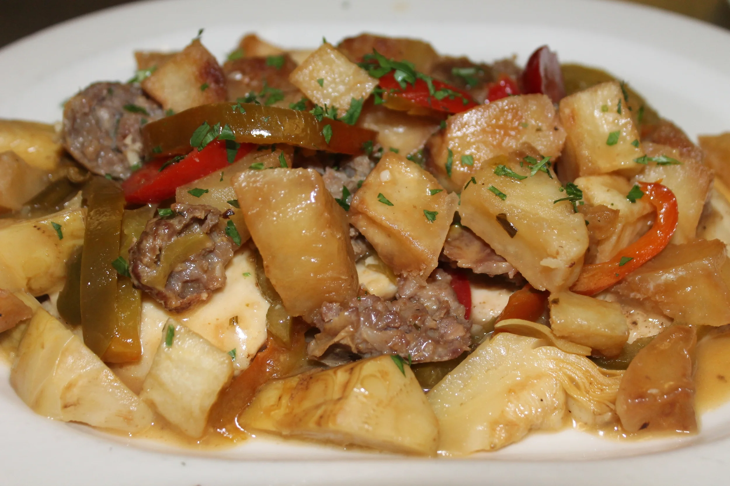 Our chicken scarpariello with artichokes, potatoes, sausage, sweet peppers and spicy peppers!