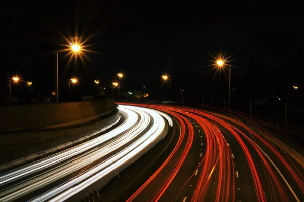 Cars speeding on a highway