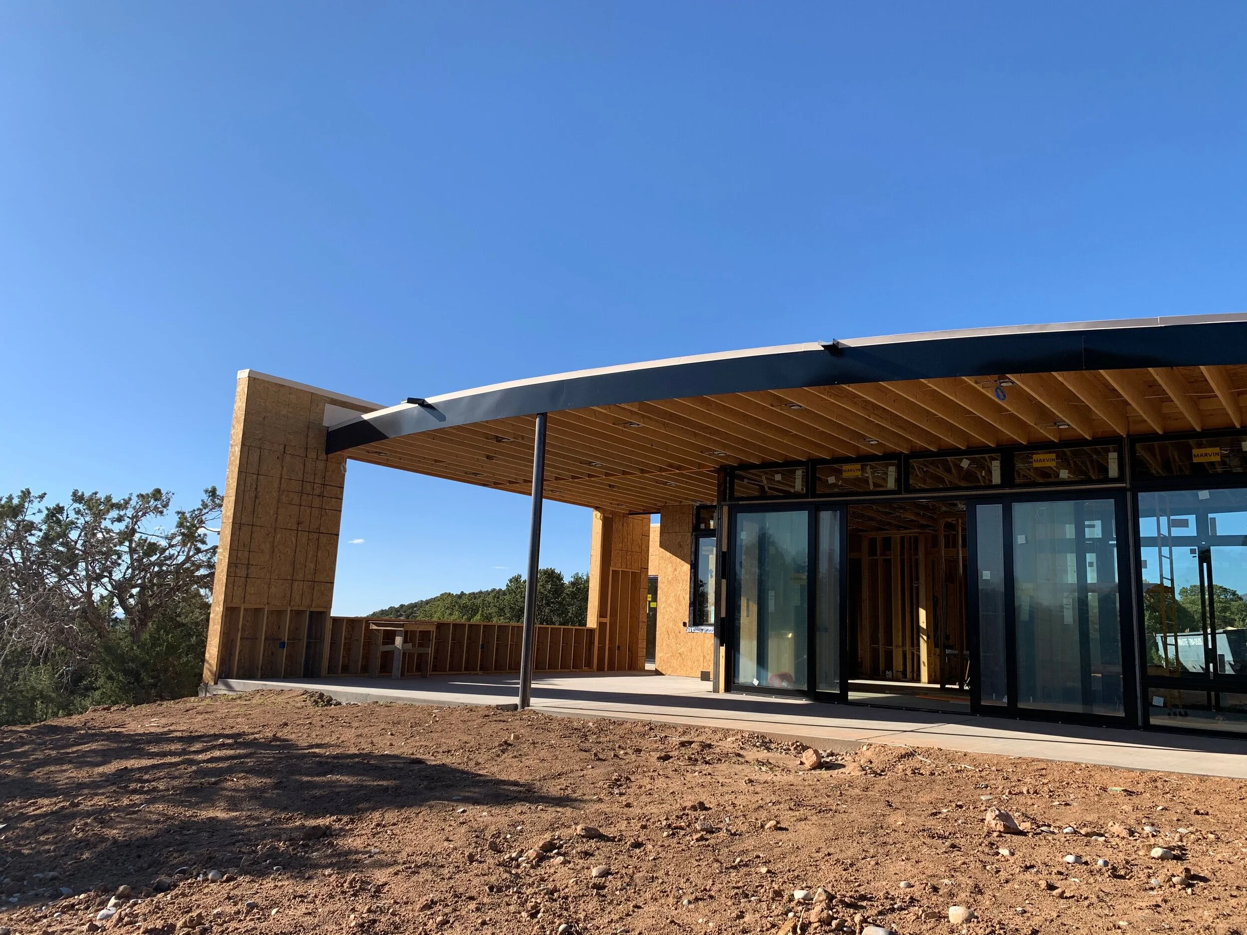 Henry4870_Ext detail of back portal w view of Jemez.jpeg