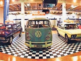1973 and 1972 Variants, a 1965 Microbus, a 1980 Brasilia, and a 1975 Puma on display at VolksWorld.