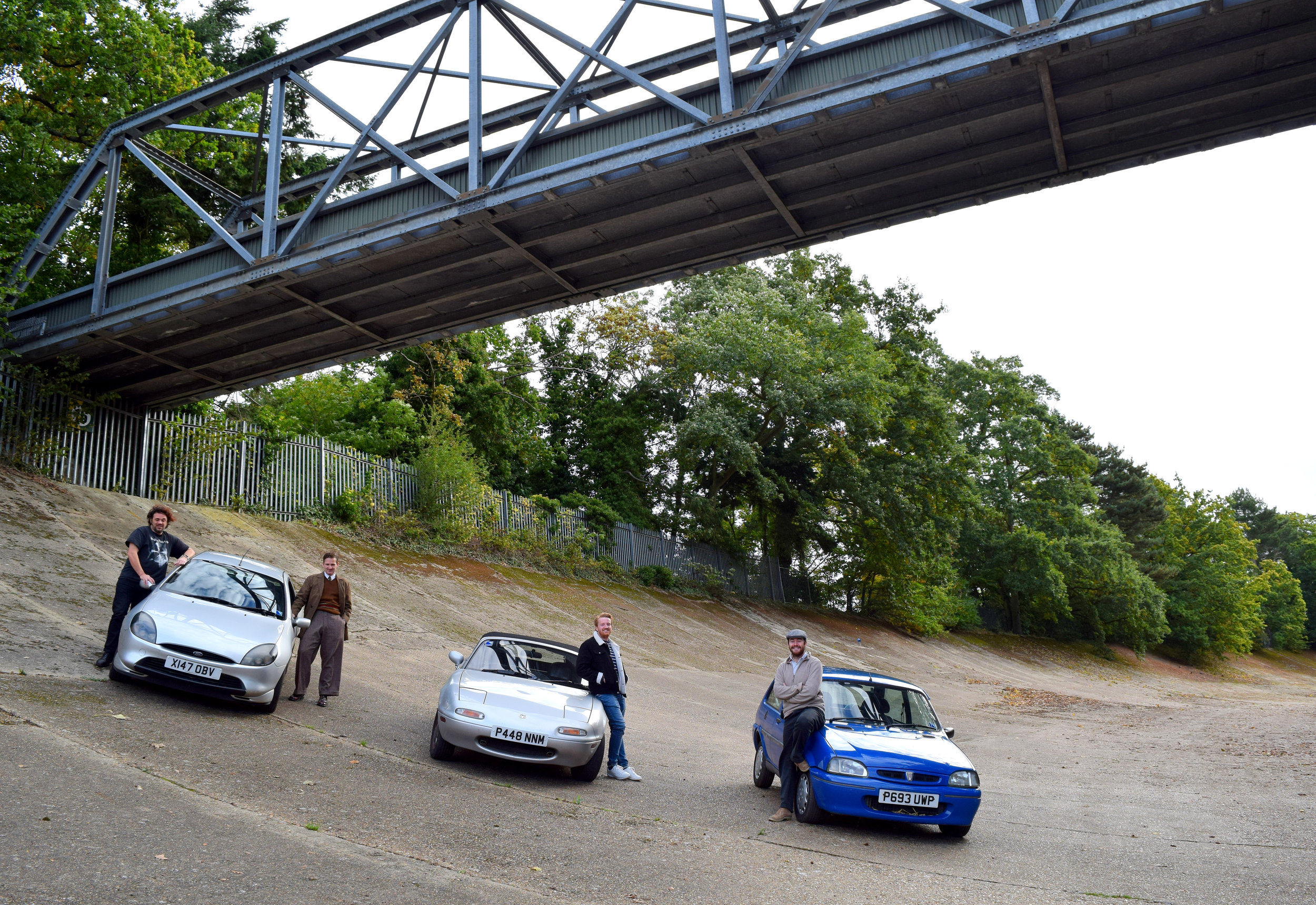 Calum Brown, Murray Scullion and Richard Kilpatrick pose with their vehicles alongside Paul Stewart - who kindly let them onto the track.&nbsp;