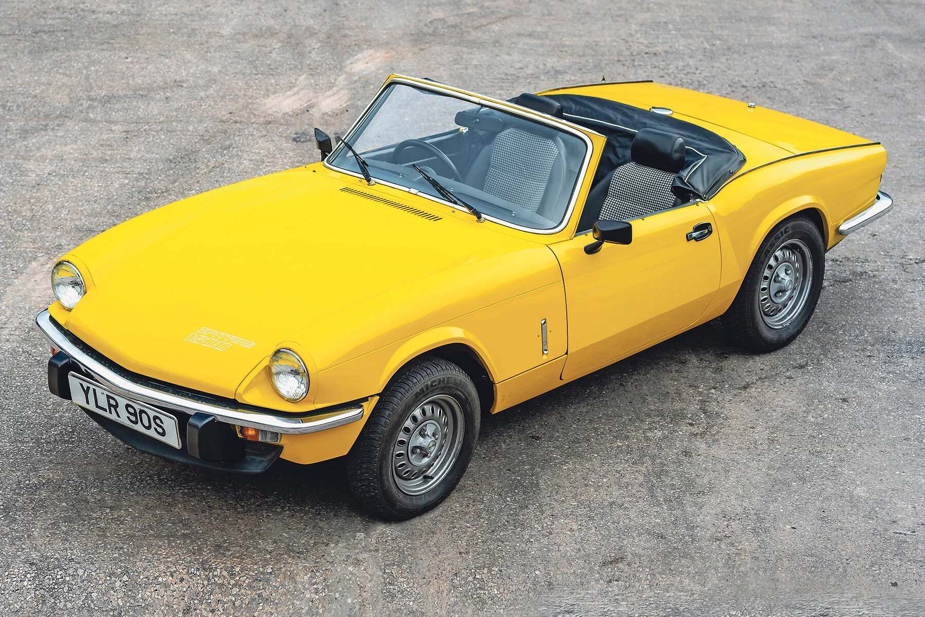 Cars consigned to the 10th anniversary sale include this 9000-mile 1978 Triumph Spitfire .