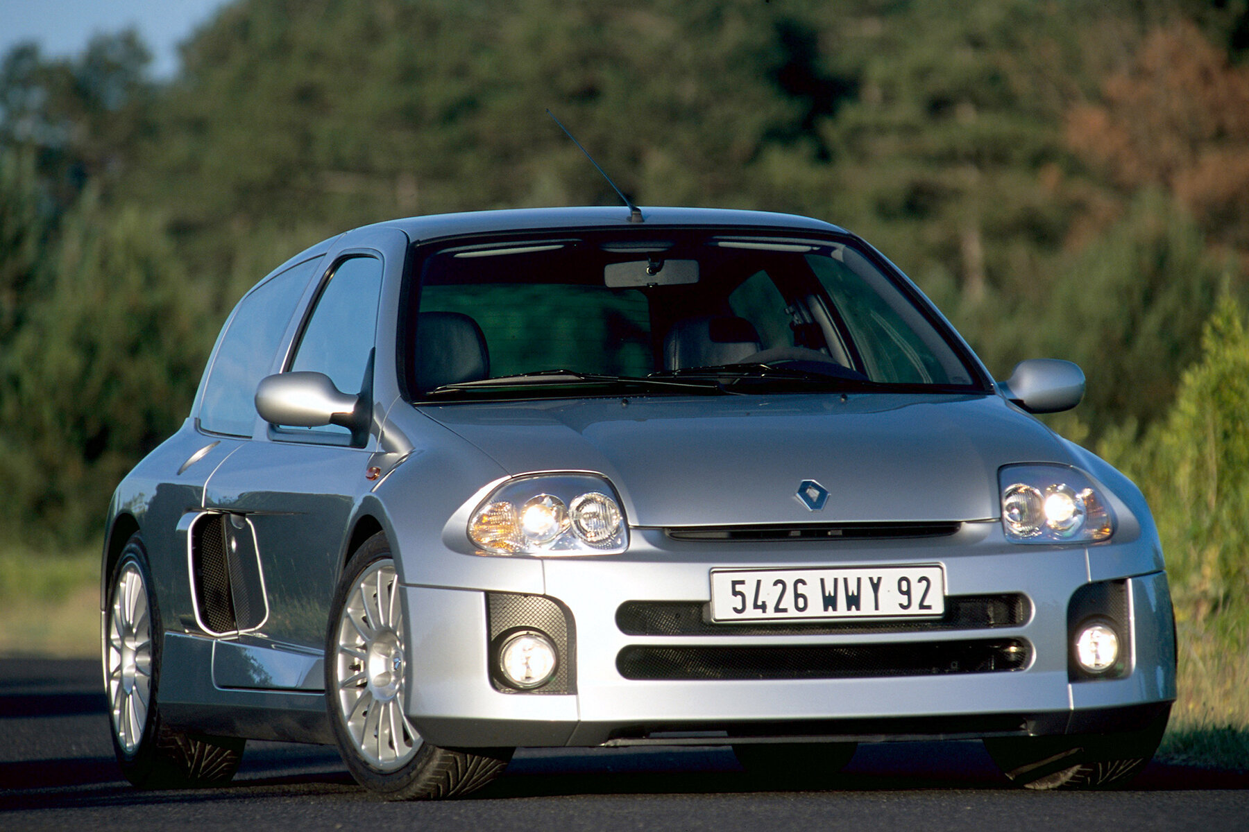 This isn’t just a Renault Clio. It’s a Renault Sport Clio V6 – more cylinders, a wider body and its engine moved behind the driver.
