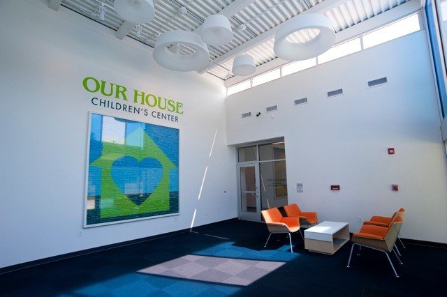 Our House Children's Center_Int_Lobby with Our House Signage.jpg