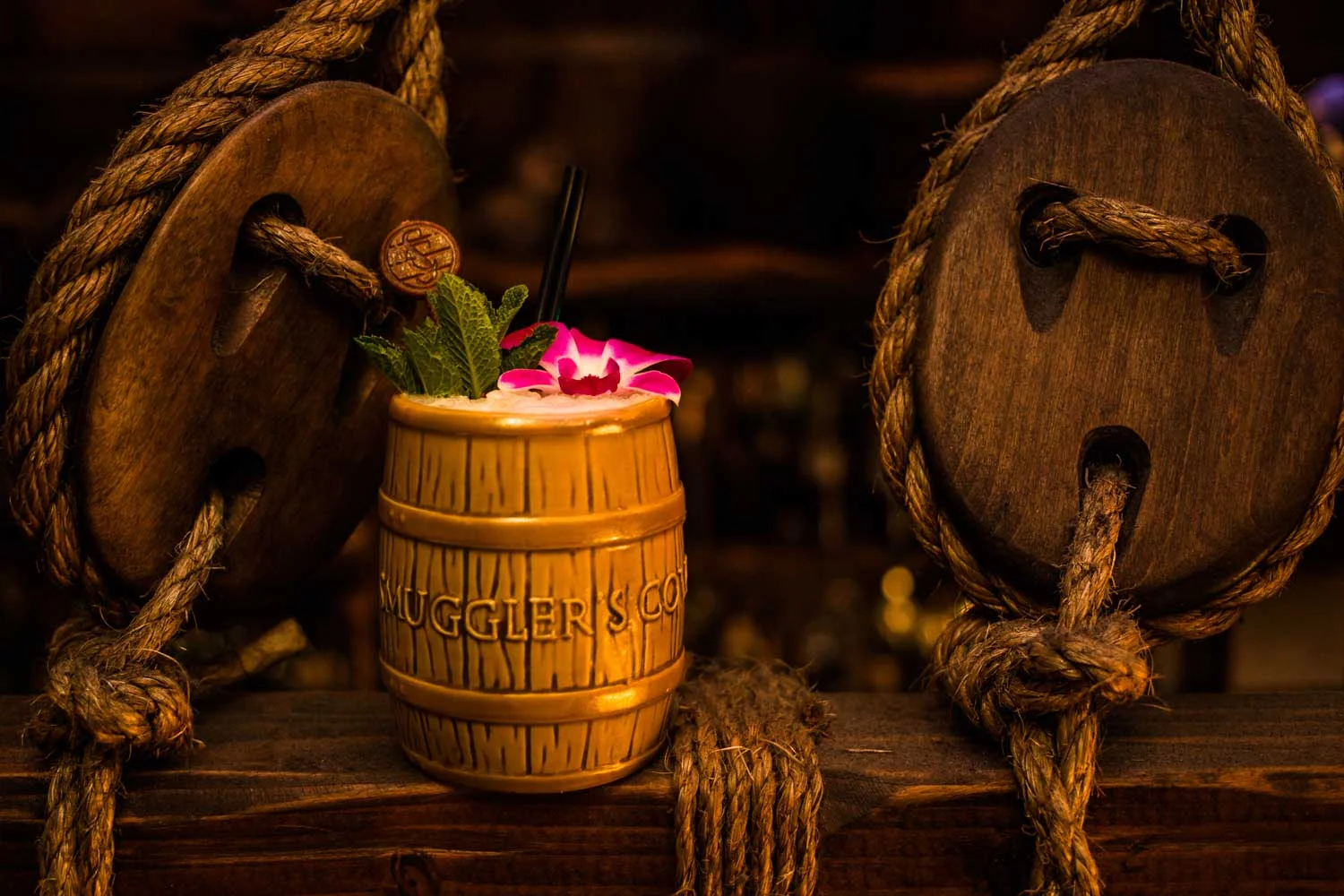 barrel drink with flower and mint leaves, Smuggler's Cove in San Francisco, pirate theme