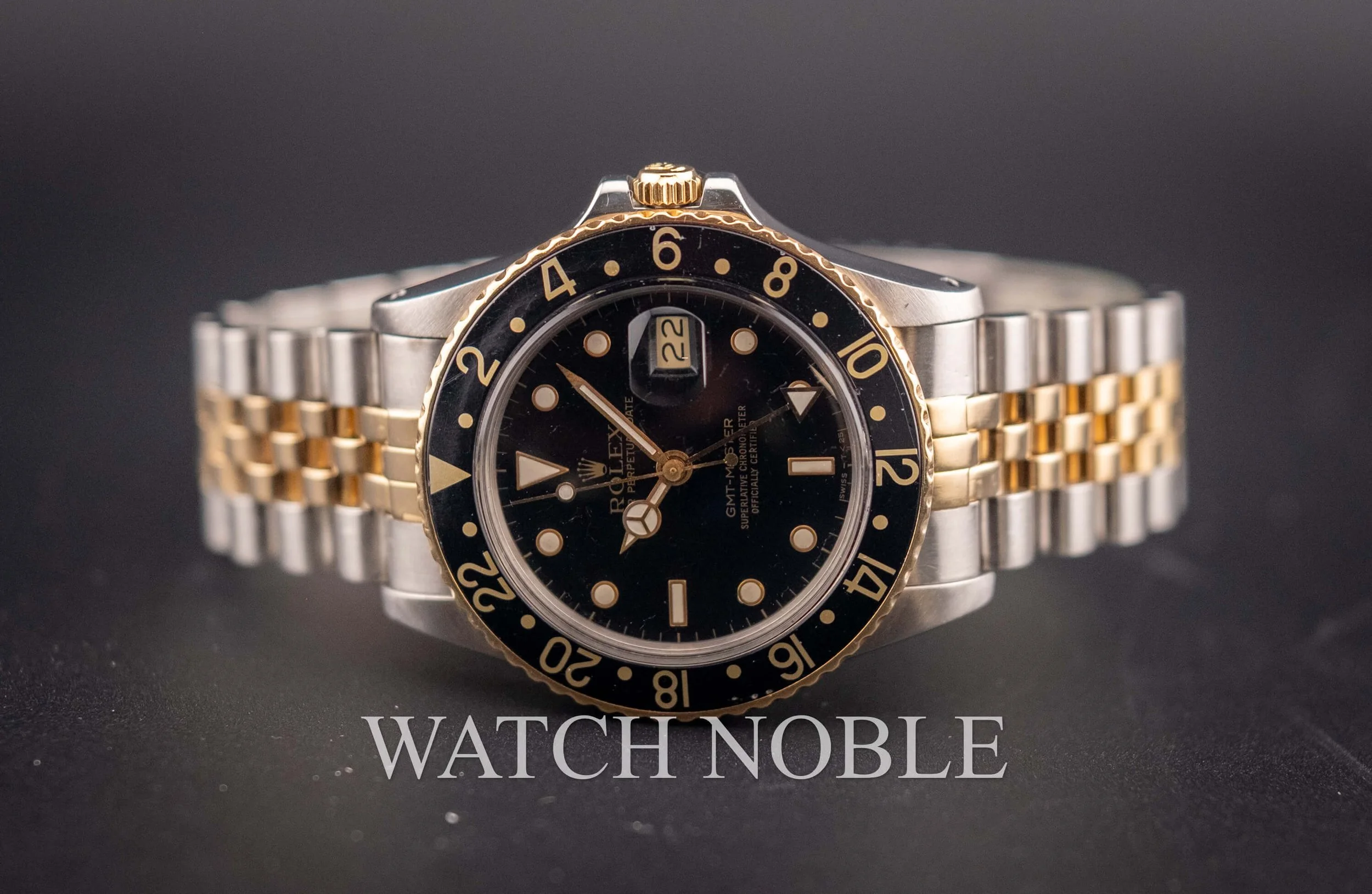 Vintage Rolex GMT Master 16753 Root Beer Bezel Stainless Steel /18k Yellow Gold Black Dial Jubilee Bracelet.