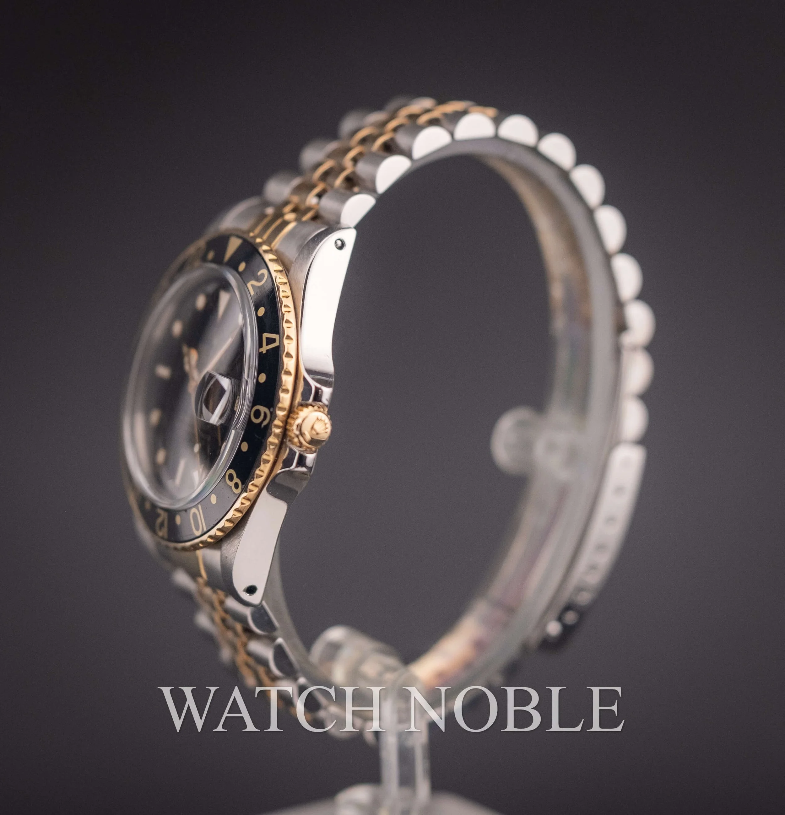Vintage Rolex GMT Master 16753 Root Beer Bezel Stainless Steel /18k Yellow Gold Black Dial Jubilee Bracelet.