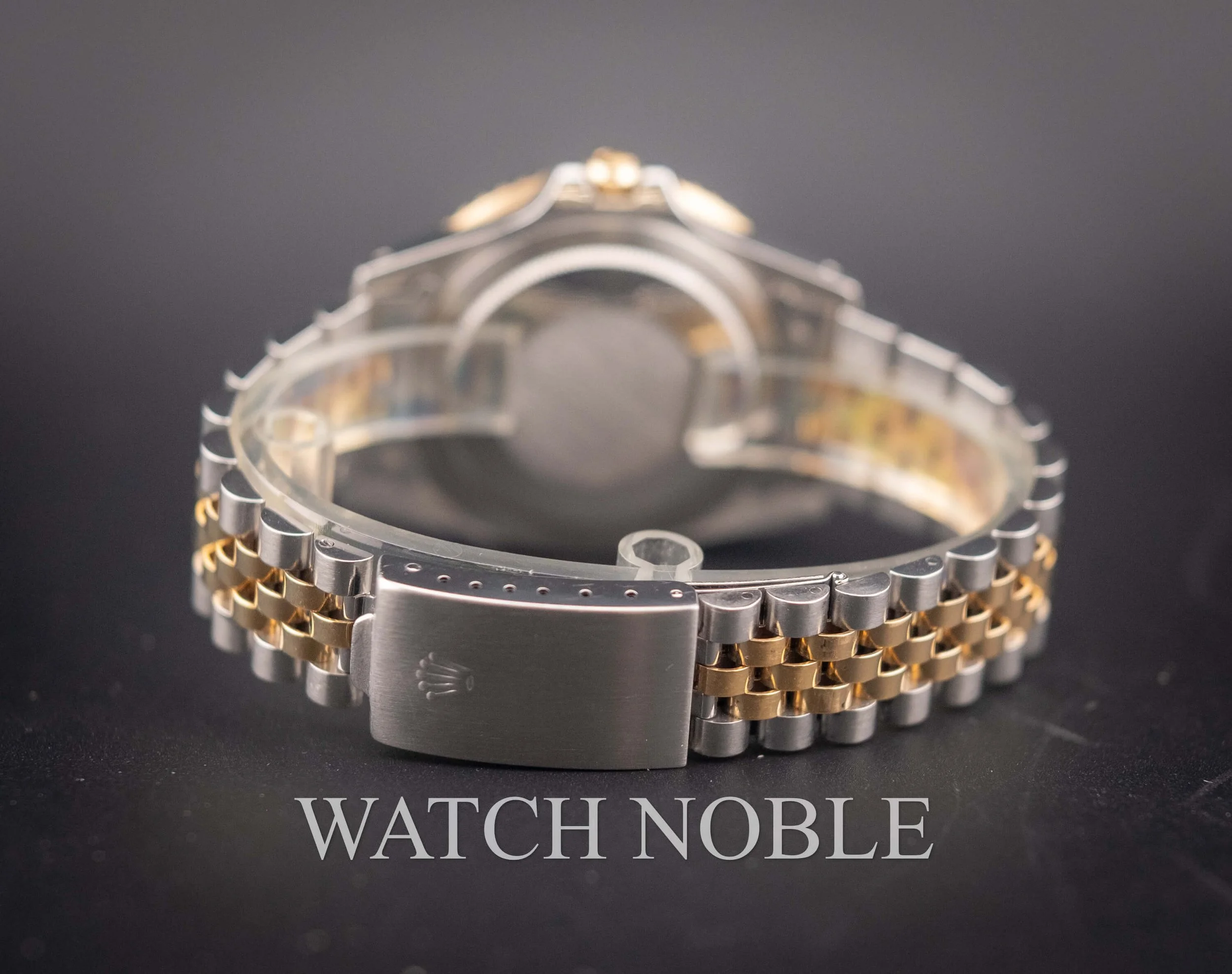 Vintage Rolex GMT Master 16753 Root Beer Bezel Stainless Steel /18k Yellow Gold Black Dial Jubilee Bracelet.