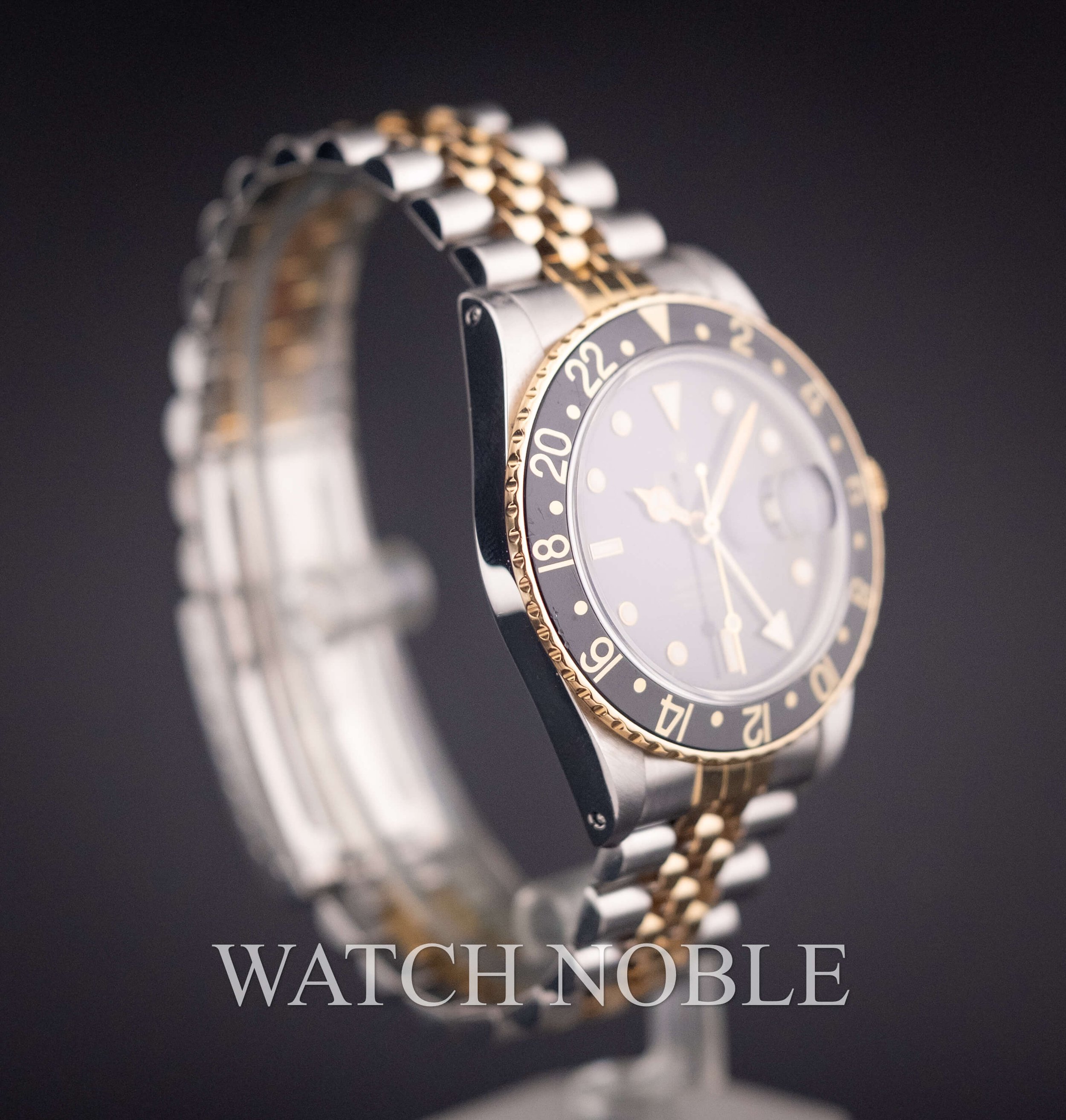 Vintage Rolex GMT Master 16753 Root Beer Bezel Stainless Steel /18k Yellow Gold Black Dial Jubilee Bracelet.