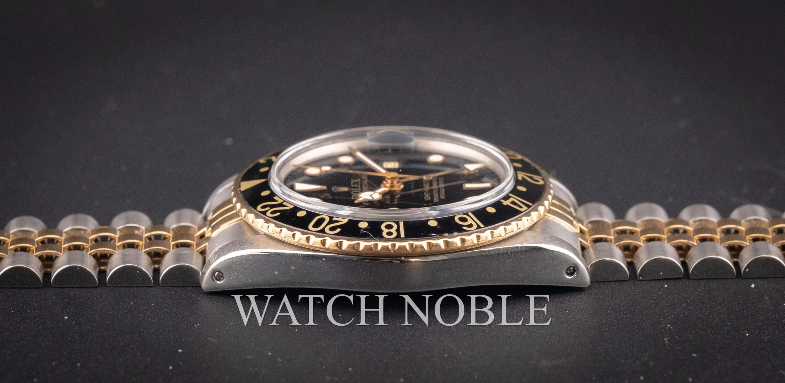Vintage Rolex GMT Master 16753 Root Beer Bezel Stainless Steel /18k Yellow Gold Black Dial Jubilee Bracelet.