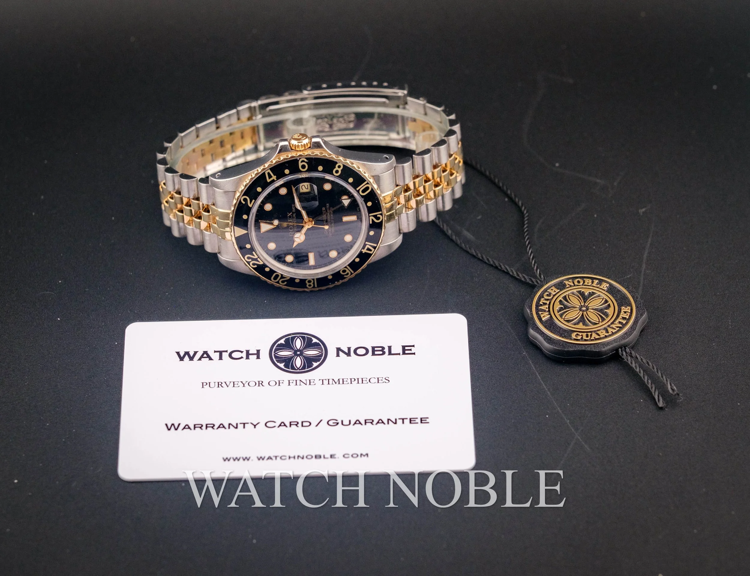 Vintage Rolex GMT Master 16753 Root Beer Bezel Stainless Steel /18k Yellow Gold Black Dial Jubilee Bracelet.
