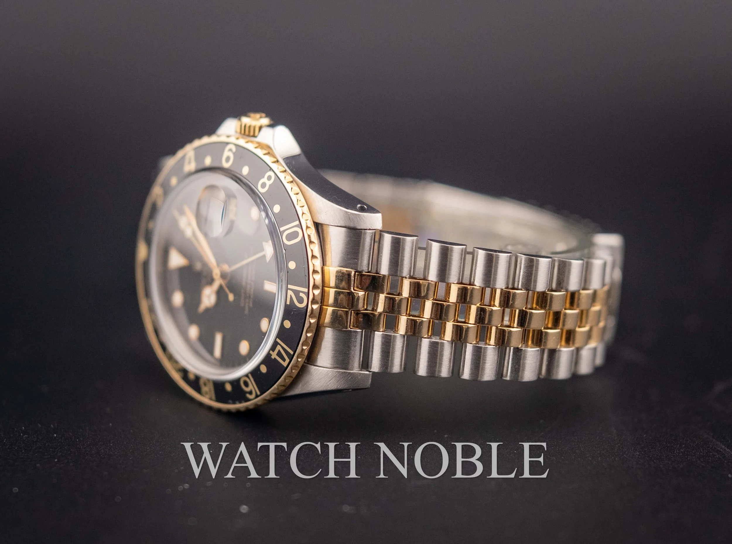 Vintage Rolex GMT Master 16753 Root Beer Bezel Stainless Steel /18k Yellow Gold Black Dial Jubilee Bracelet.