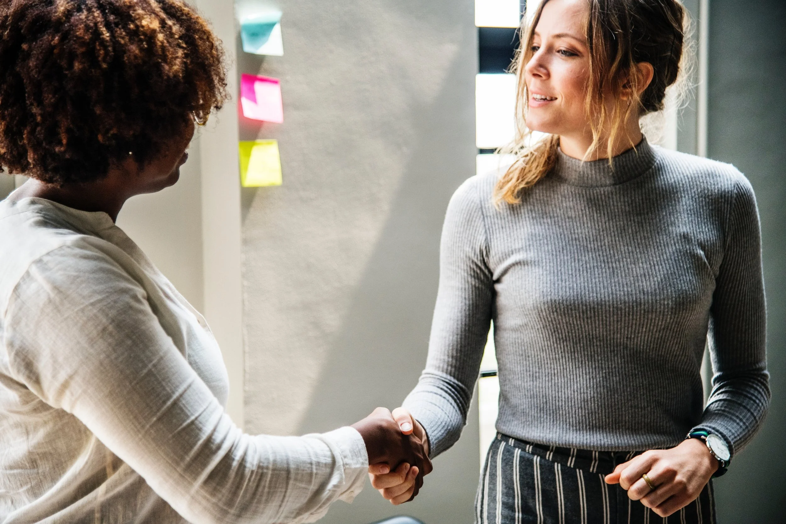 women shaking hands.jpg