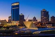 Downtown Milwaukee skyline at night courtesy of @MilwDowntown.
