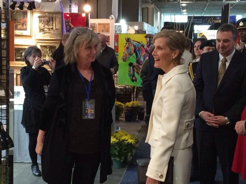  Artist Janice Ykema at the Royal Agricultural Winter Fair with Countess Sophie admiring her art&nbsp; 