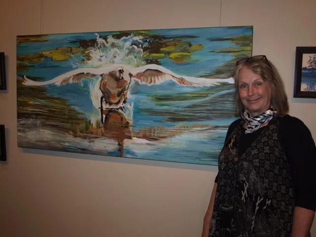 Artist Janice Ykema with one of her artworks that was exhibited at the Holcim Gallery April 10 to 30, 2017.
