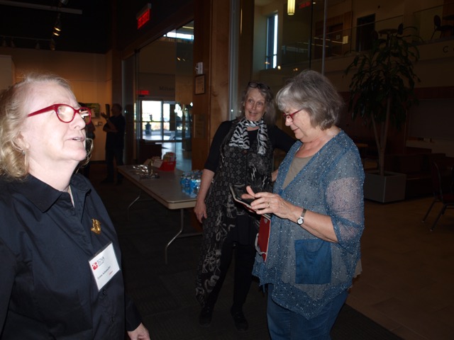 Artists Lynn Schumacher, Janice Ykema and Paulette Murphy at the Meet the Artists reception at the Holcim Gallery April 2017.