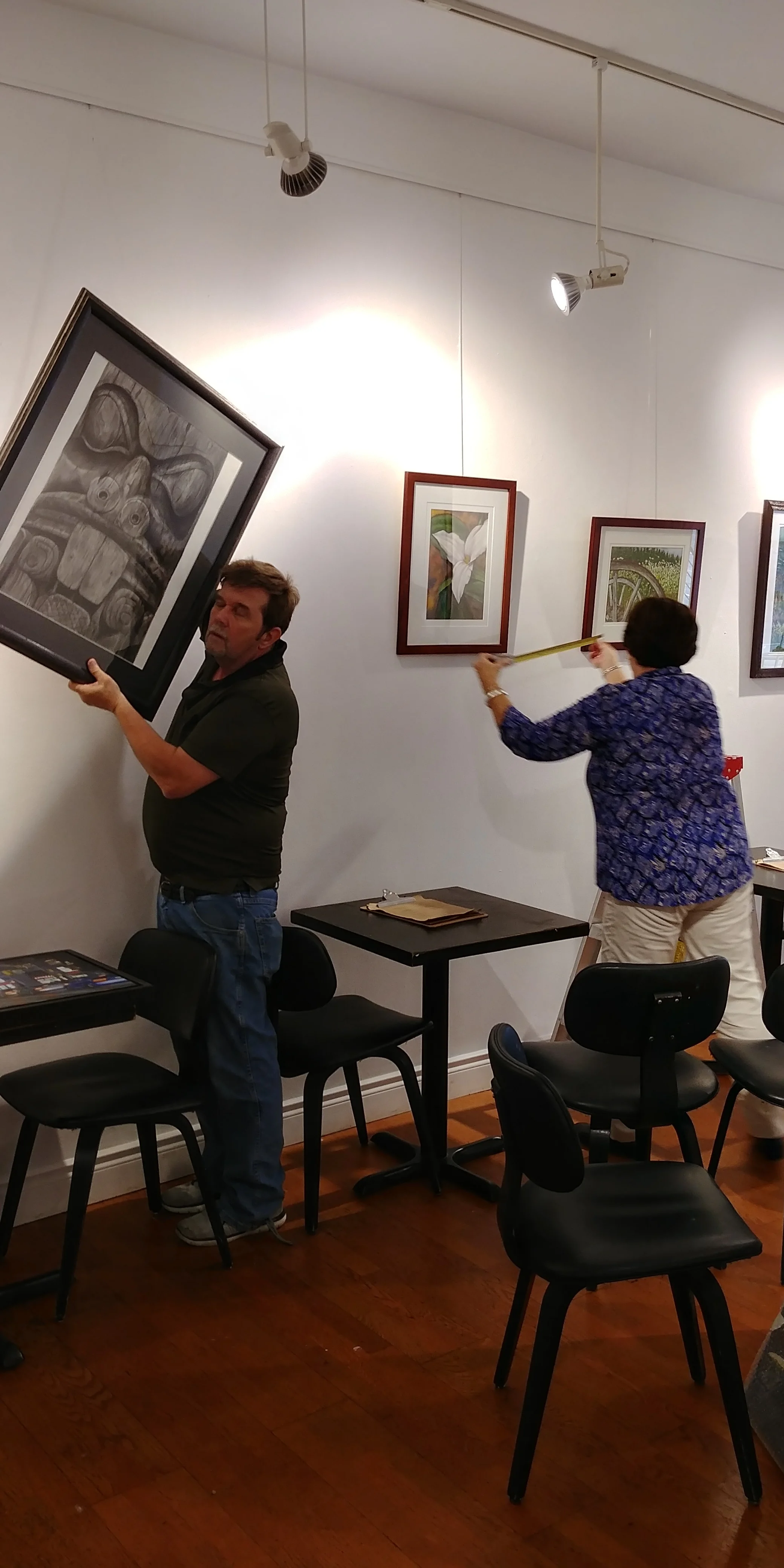 Preparing the exhibition at the Art Square Gallery, Toronto.
