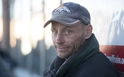 man_with_broncos_baseball_cap-400x250.jpg