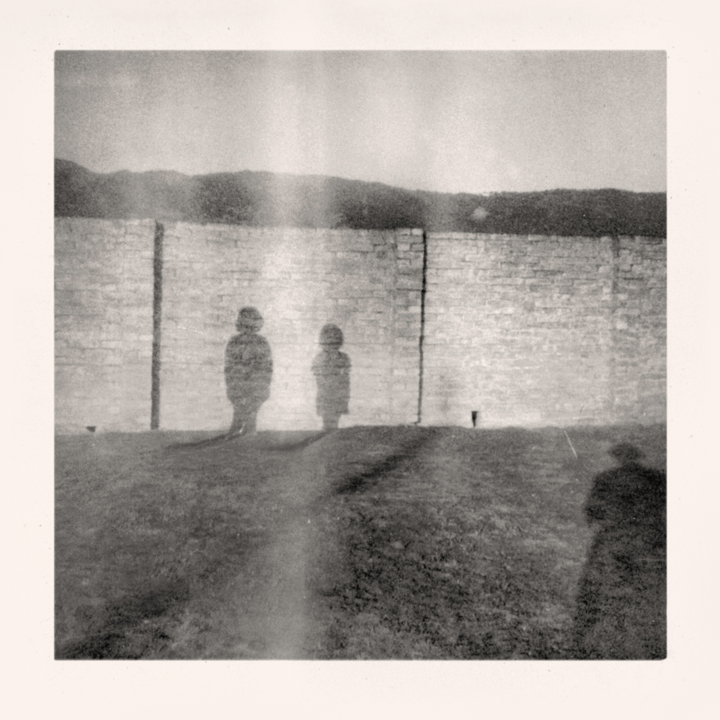 Traces: Girls Posing by Wall