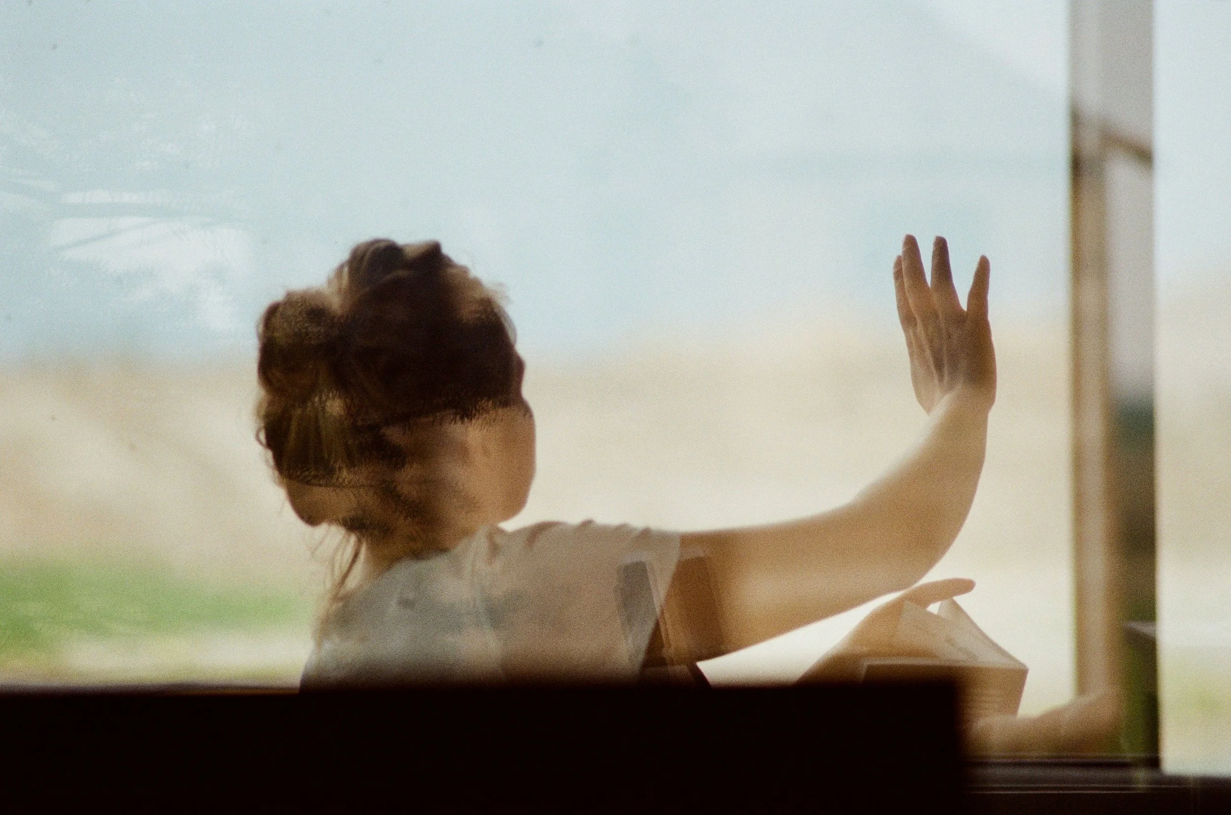 Mother waving goodbye