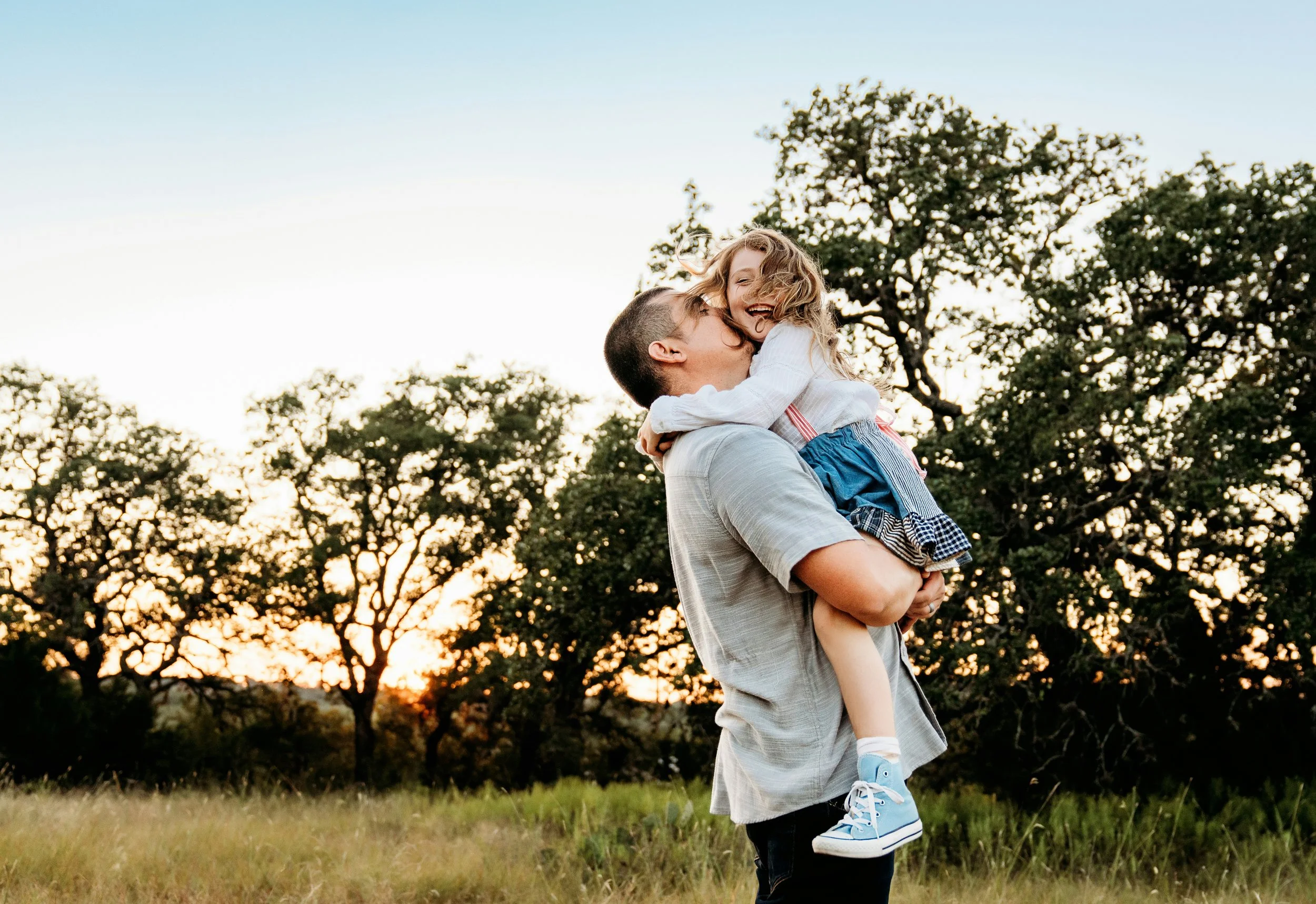 Girl hugging father happy