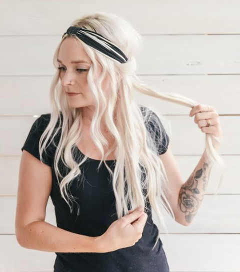 3 - Grab your next section and continue looping hair around headband towards the back of your head. 