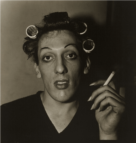 A-Young-Man-in-Curlers-at-Home-on-West-20th-Street--N.Y.C.-1966-Scandaleuse Photography-Diane Arbus-photographer-toronto-female photographer-canada-ontario-blog-blogger-toronto photographer-photo.png