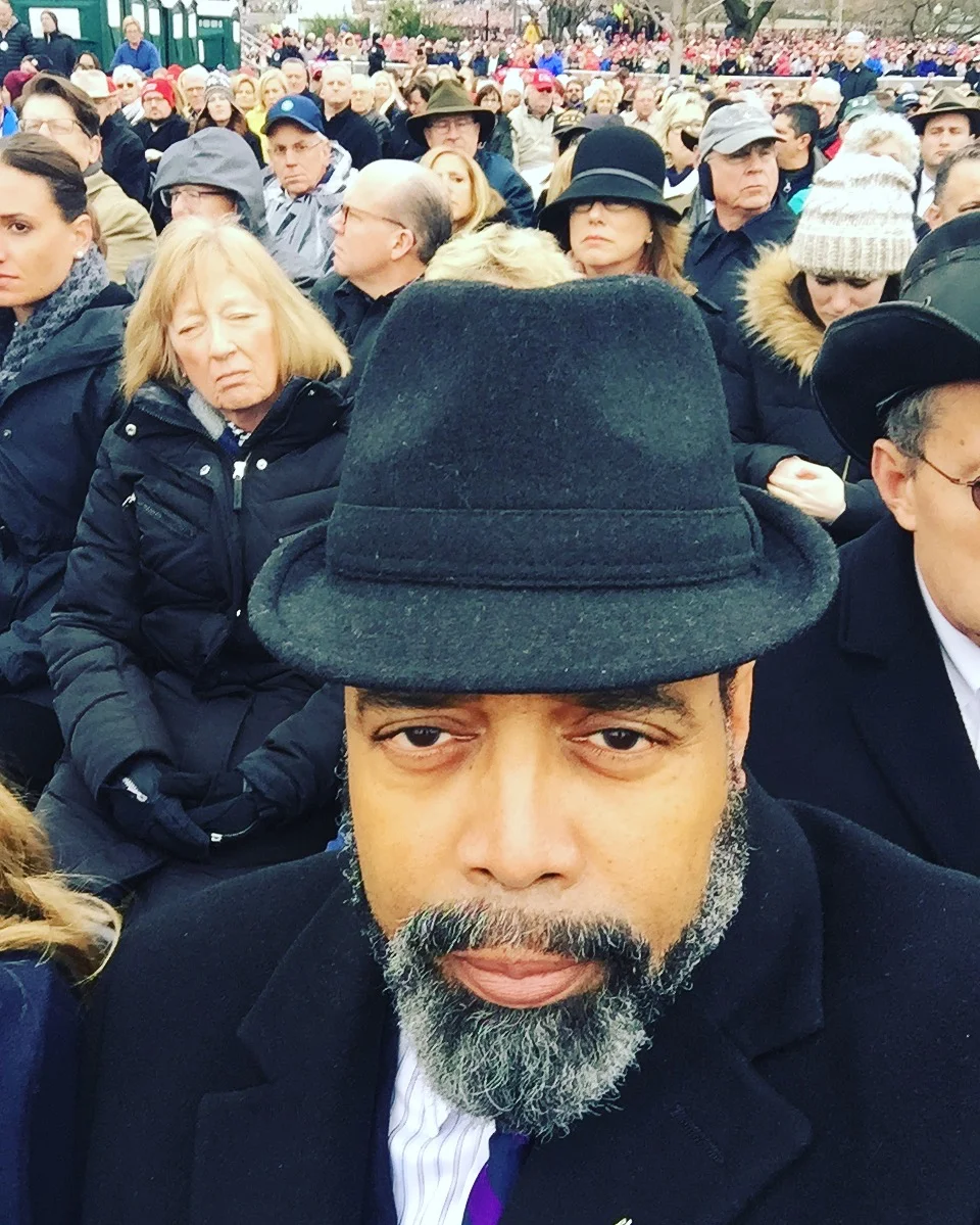 Look at the faces of the people around me. Doesn't look like a celebration, does it?