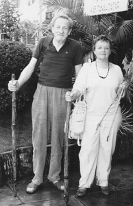 John and Anne Summerfield outside their hotel in Batu Sangkar, West Sumatra, after a trek through the hills to a macrame village.