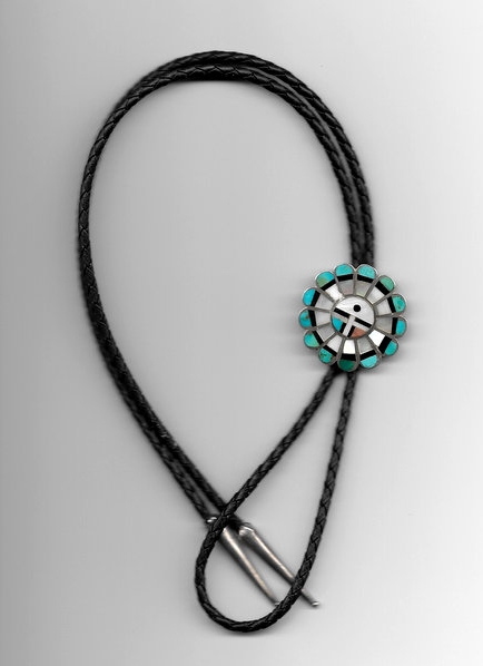 The Bolo Tie was not stolen but is similar to the missing items.