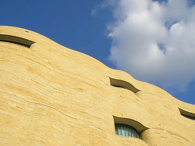 Side of the National Museum of American Indian in Washington, D.C., Author Aguebor, 10 September 2017. Wikimedia Commons.