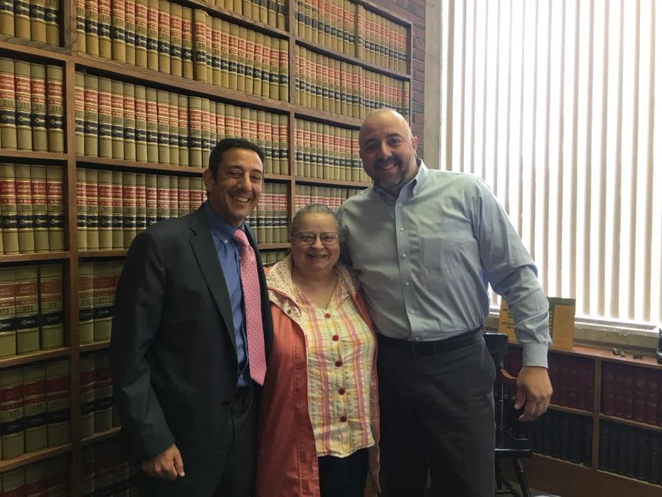 Attorney Michael Schein and Ed Collins at a real estate closing in Rhode Island.