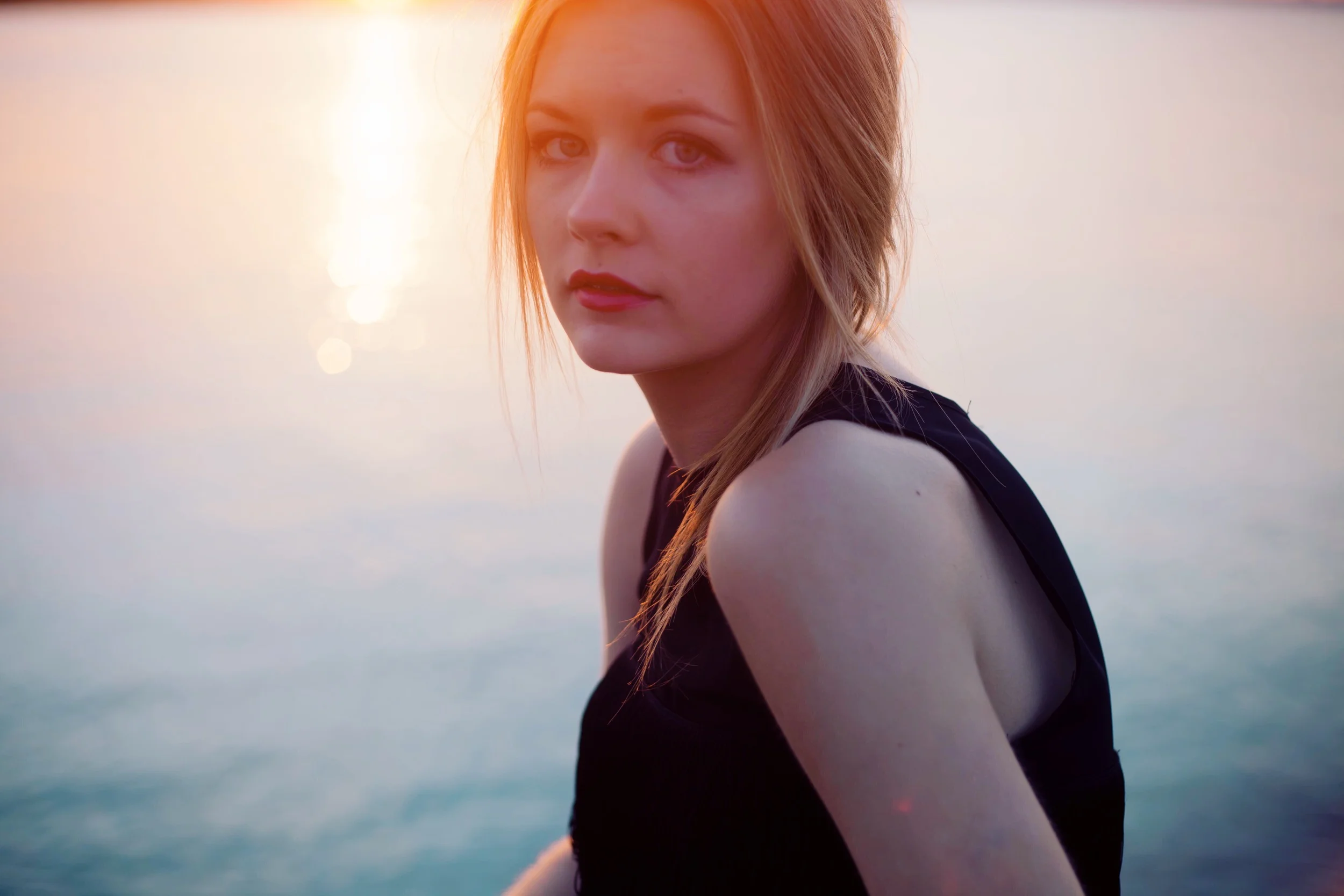 young girl portrait by the ocean