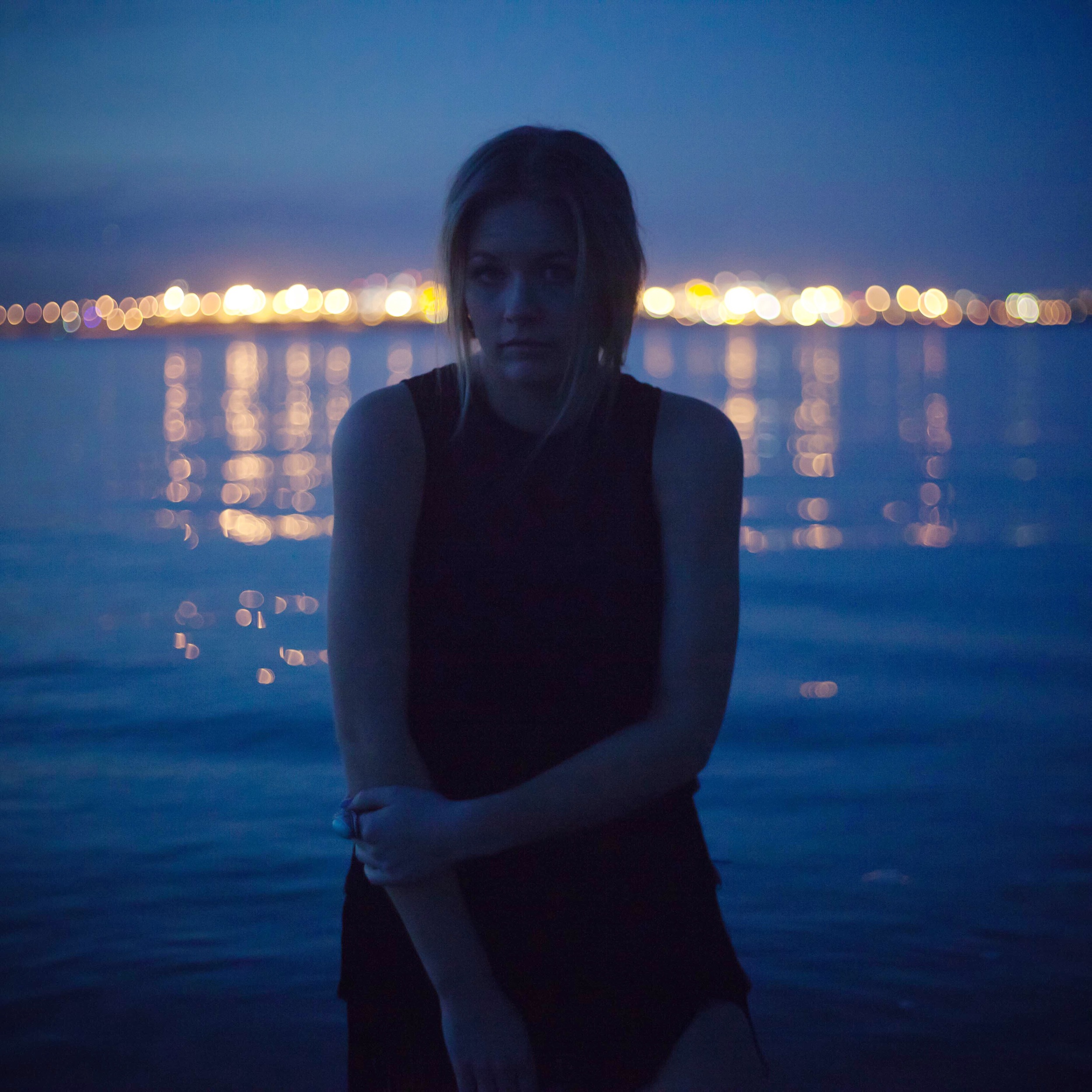 young girl portrait by the ocean