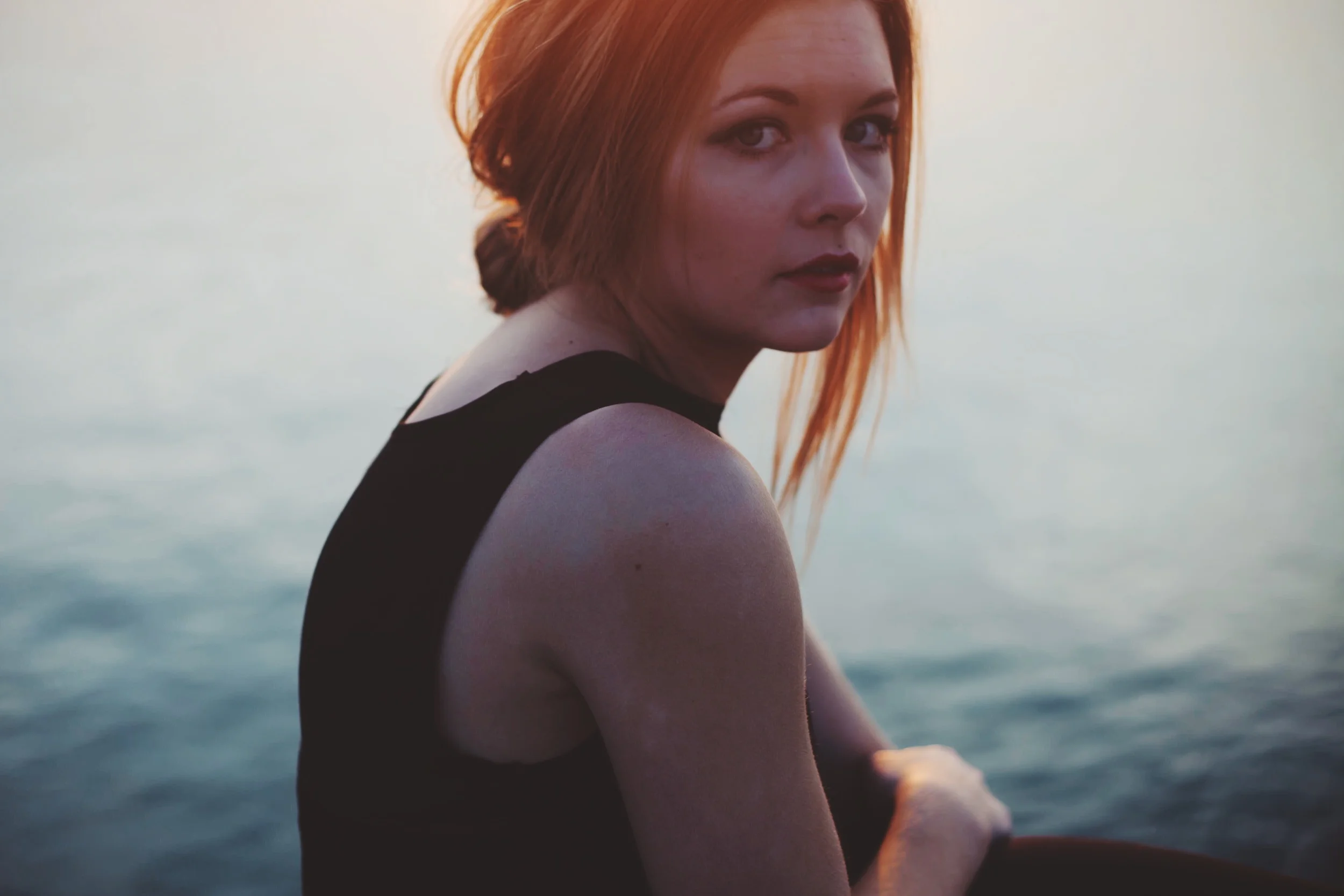 young girl portrait by the ocean