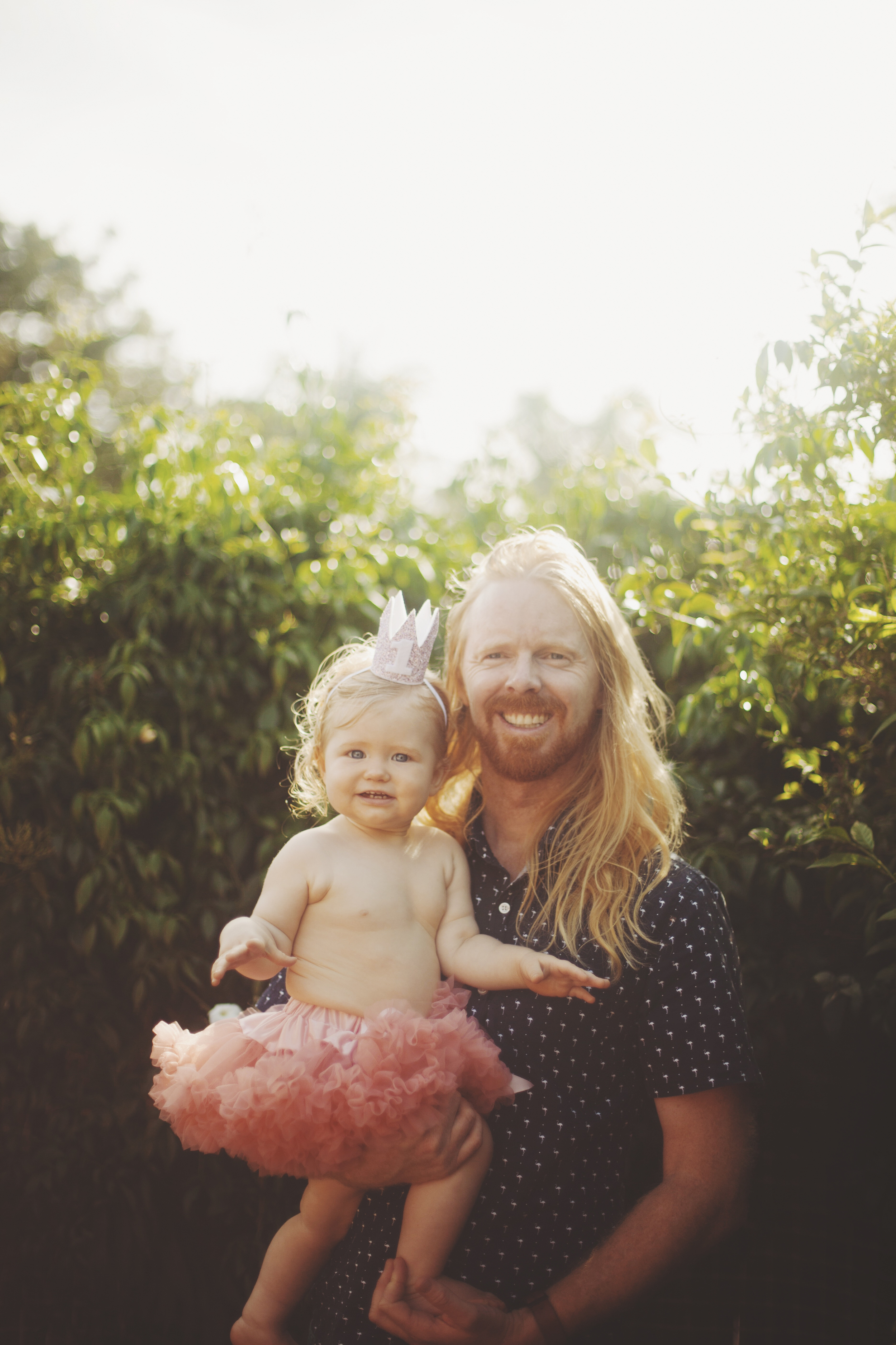 Father and baby at first birthday party