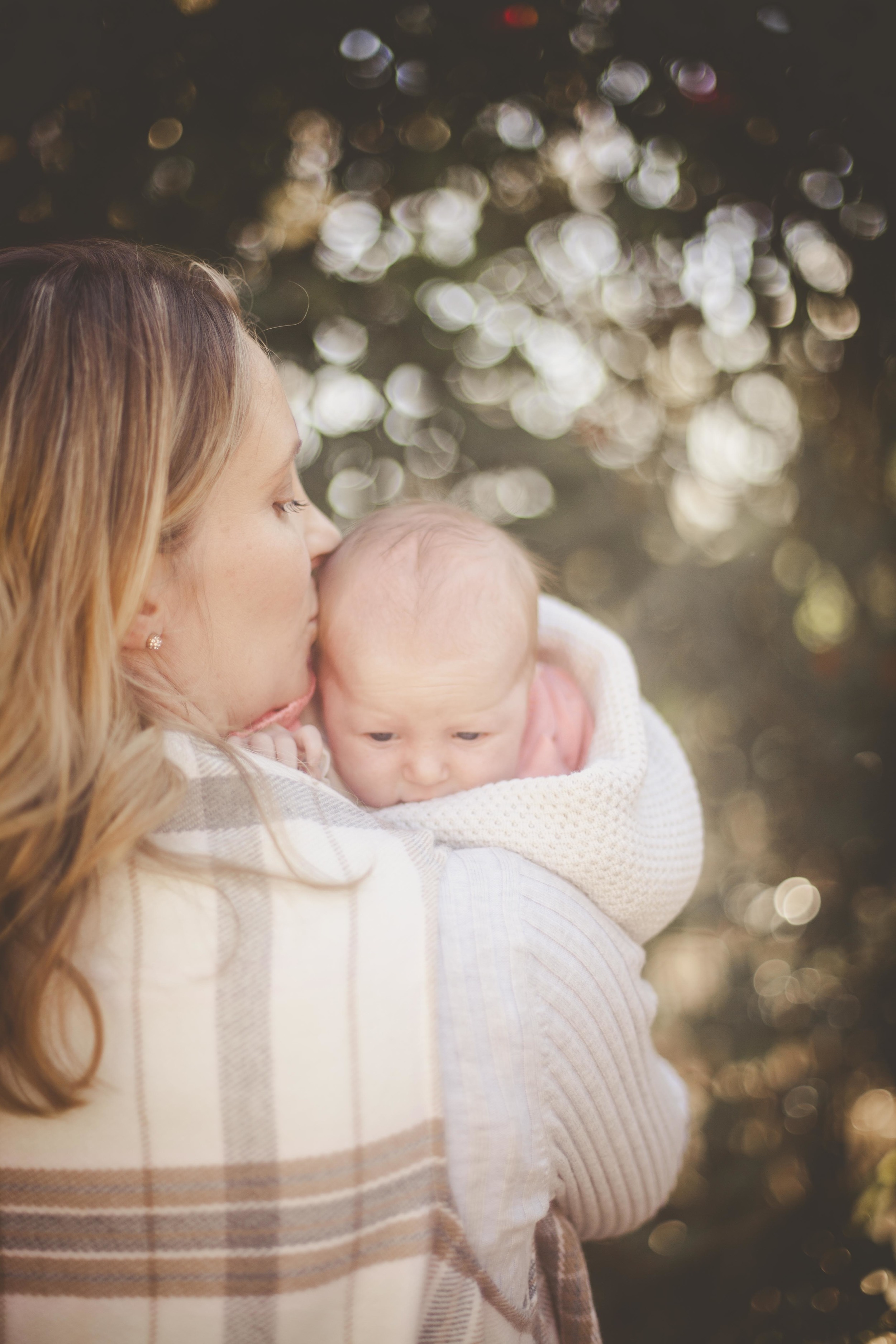 mother holding newborn