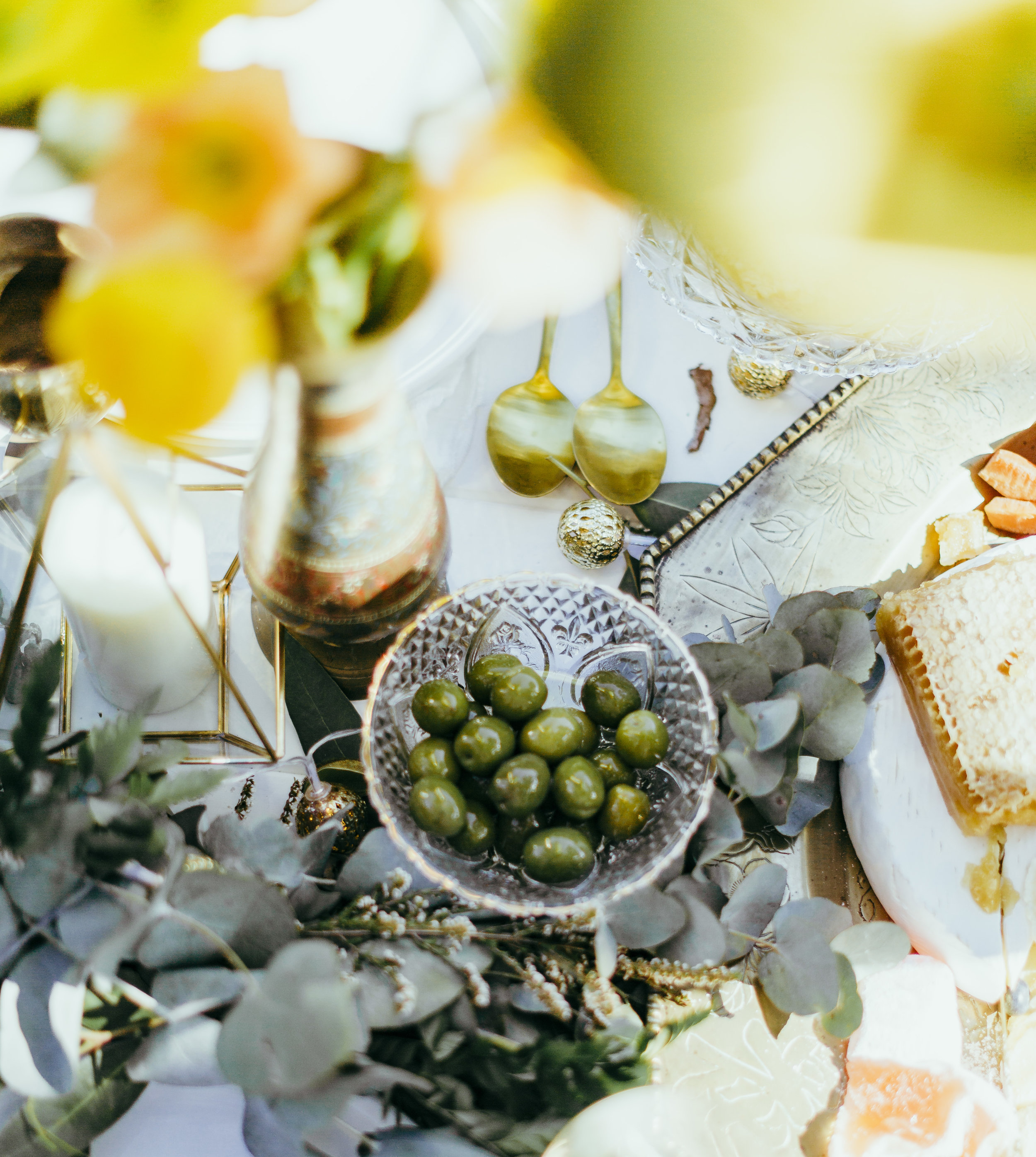 Birthday party styled with floral table settings, grazing plates, chocolate meringue, flower crowns and confetti