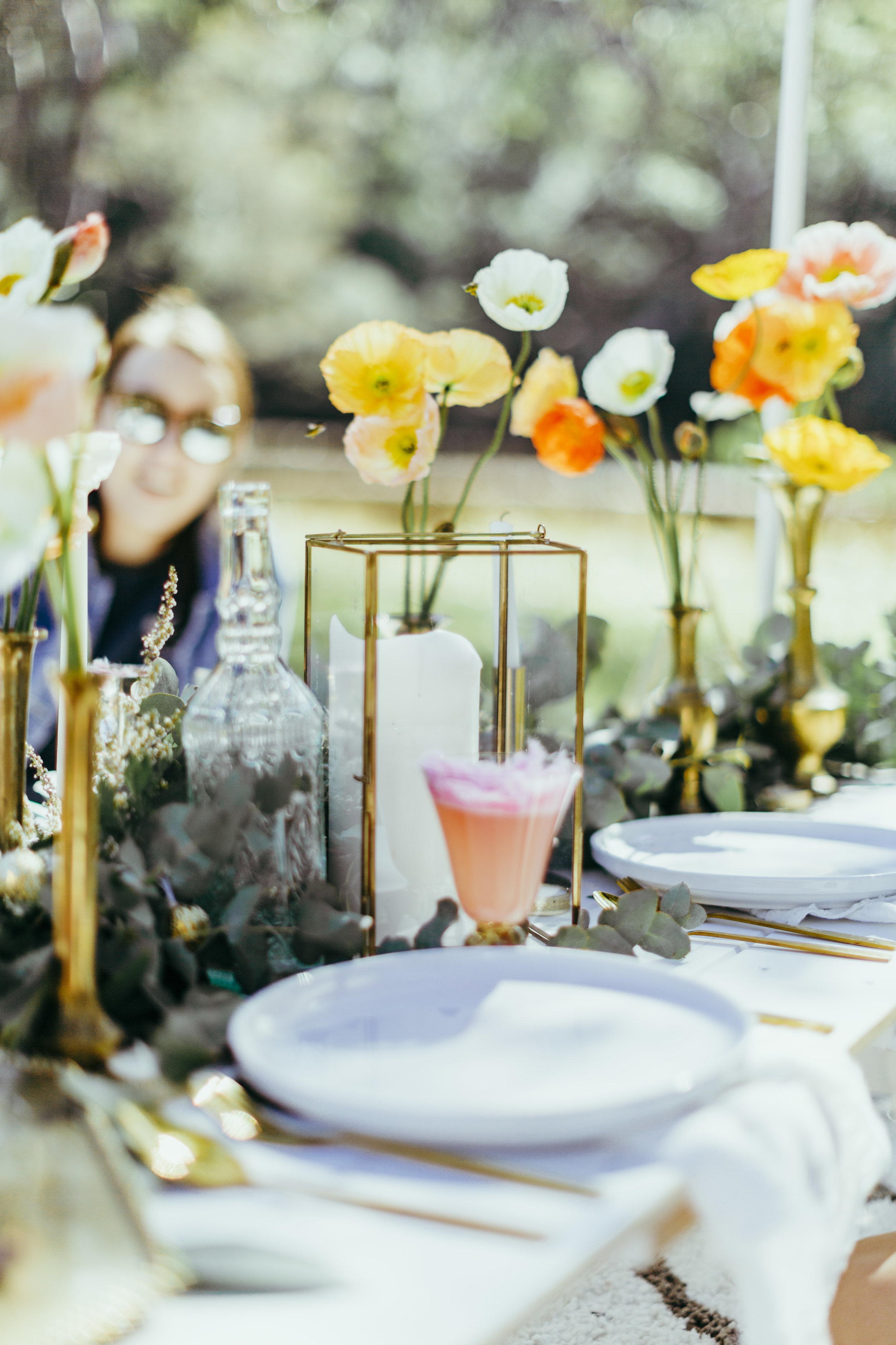 Birthday party styled with floral table settings, grazing plates, chocolate meringue, flower crowns and confetti