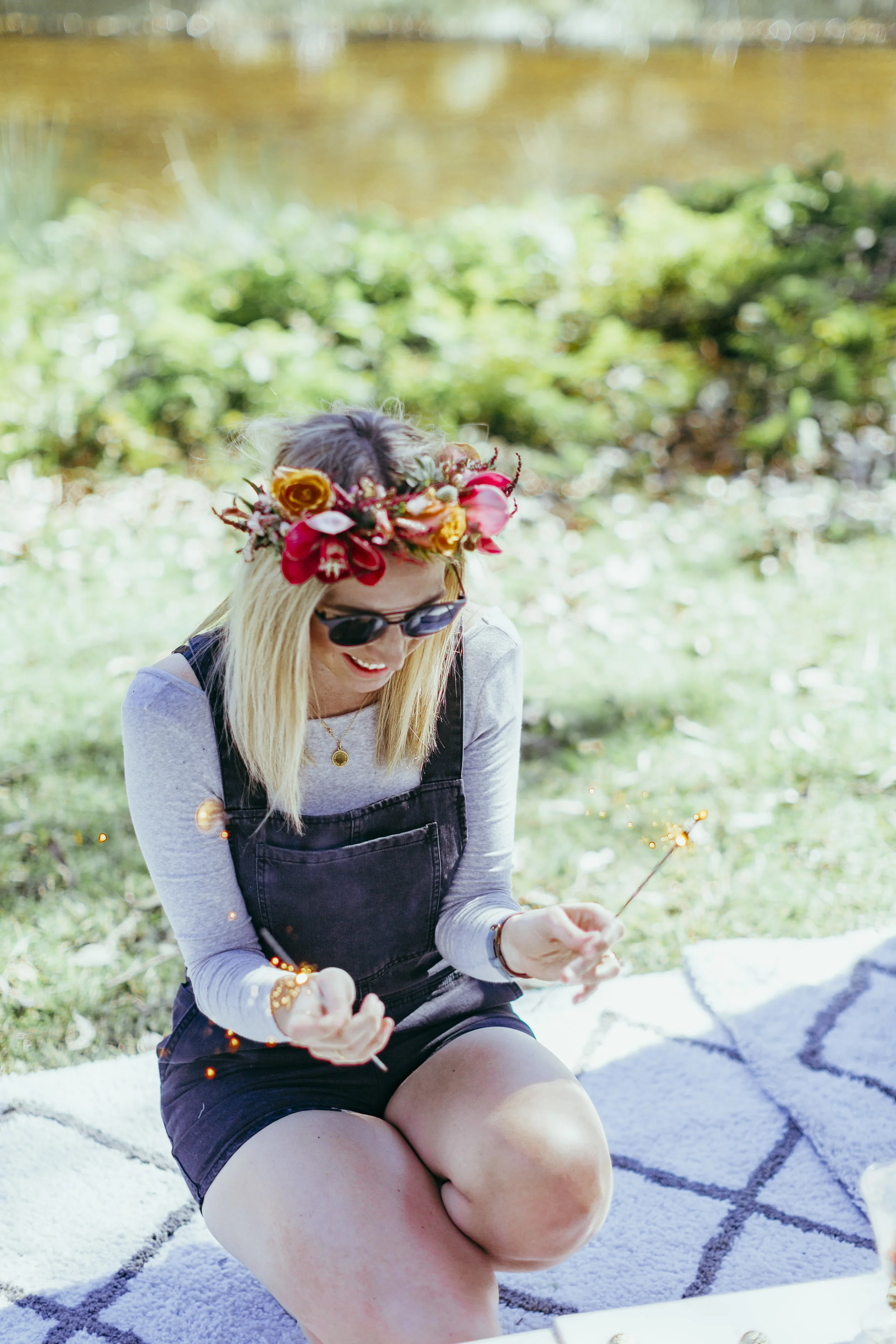 Birthday party styled with floral table settings, grazing plates, chocolate meringue, flower crowns and confetti