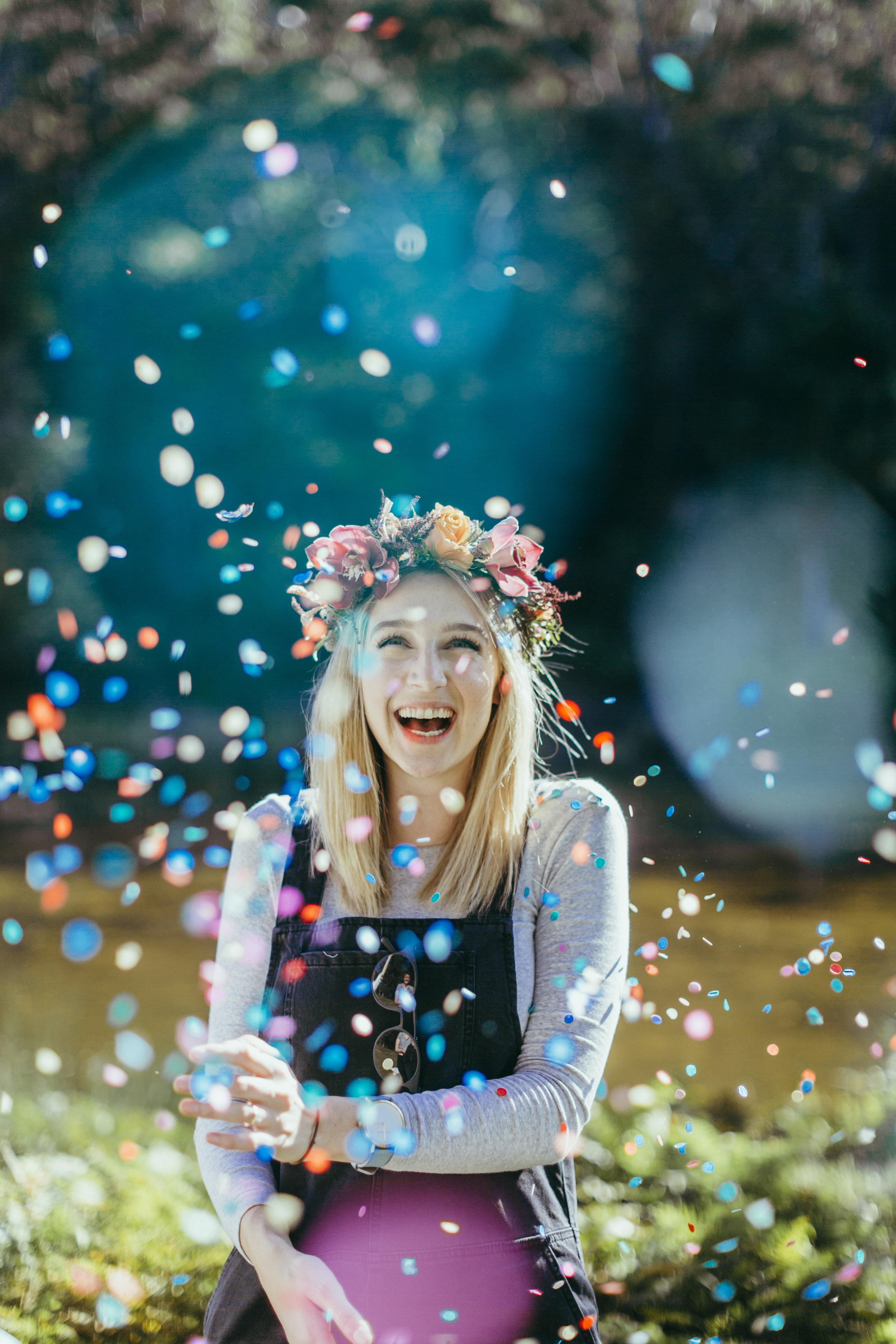 Birthday party styled with floral table settings, grazing plates, chocolate meringue, flower crowns and confetti