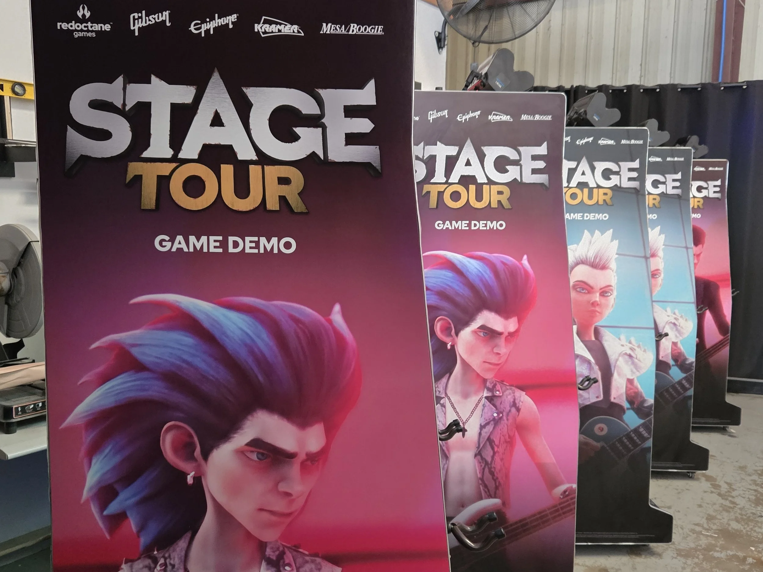 Limited-edition STAGE TOUR rhythm game arcade machine with custom graphics, G-SYNC monitor, and professional arcade cabinet construction for game launch events.