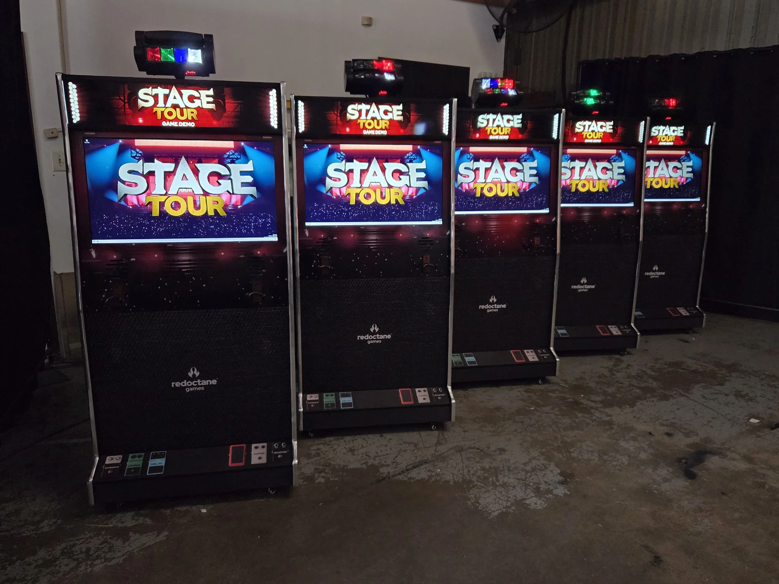 Custom STAGE TOUR arcade cabinet built by Paradox Arcade Systems featuring Guitar Hero-style controls, custom Red Octane artwork, and a high-performance gaming PC.