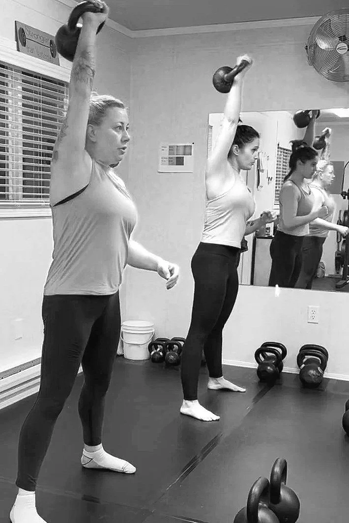 Custom online strength program with kettlebell technique training