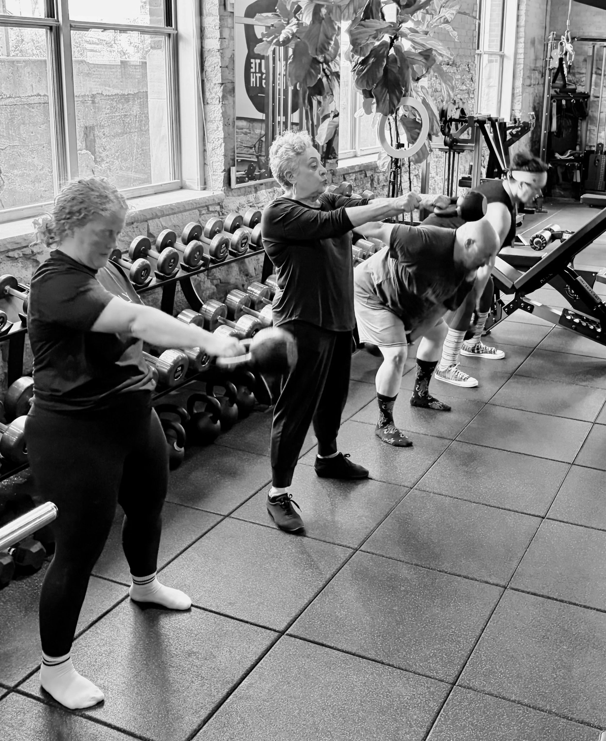 Coach Ericka teaching small group kettlebell training in Minneapolis
