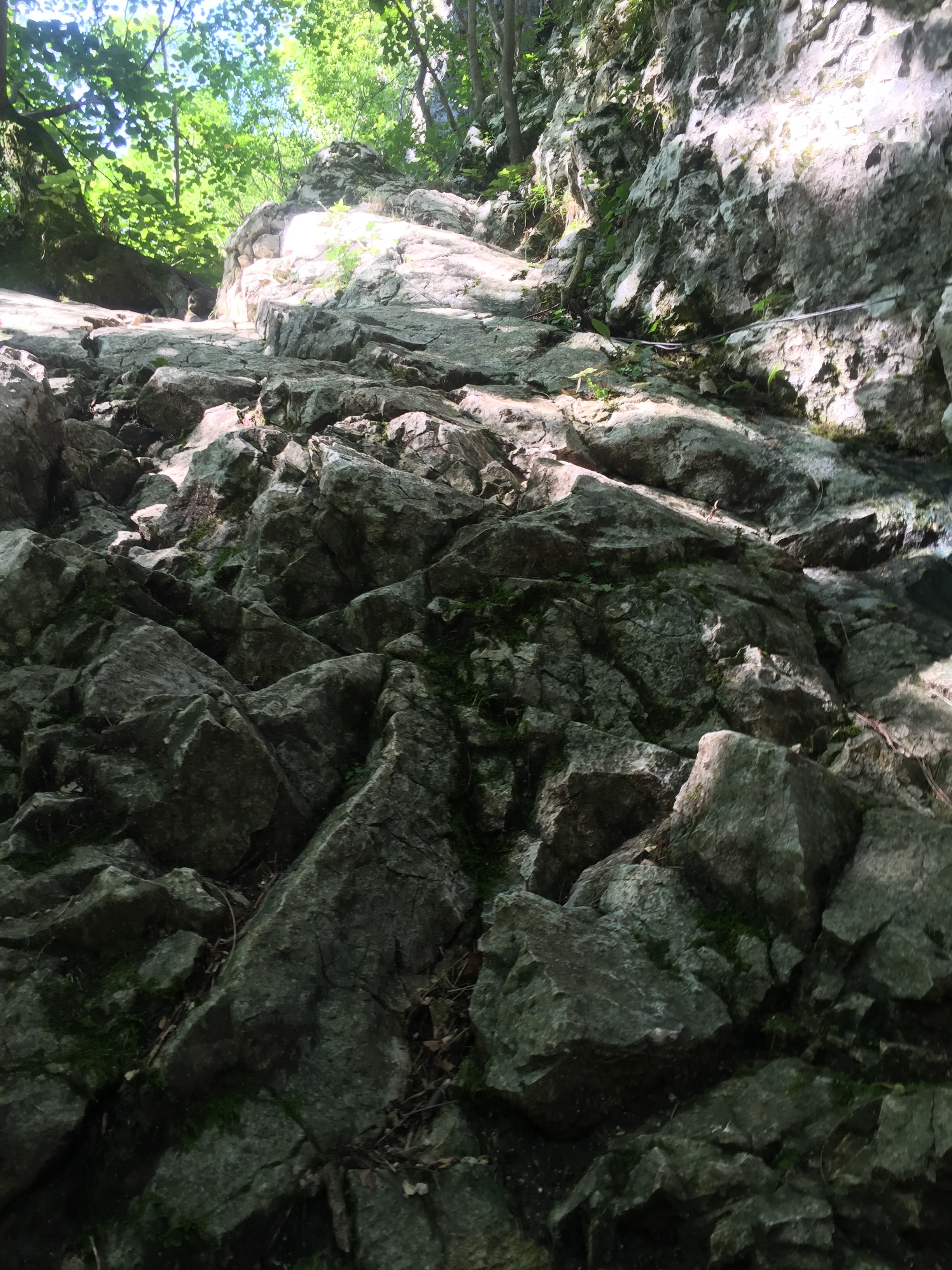 Can you spot the metal cord to help you climb up the "trail"?