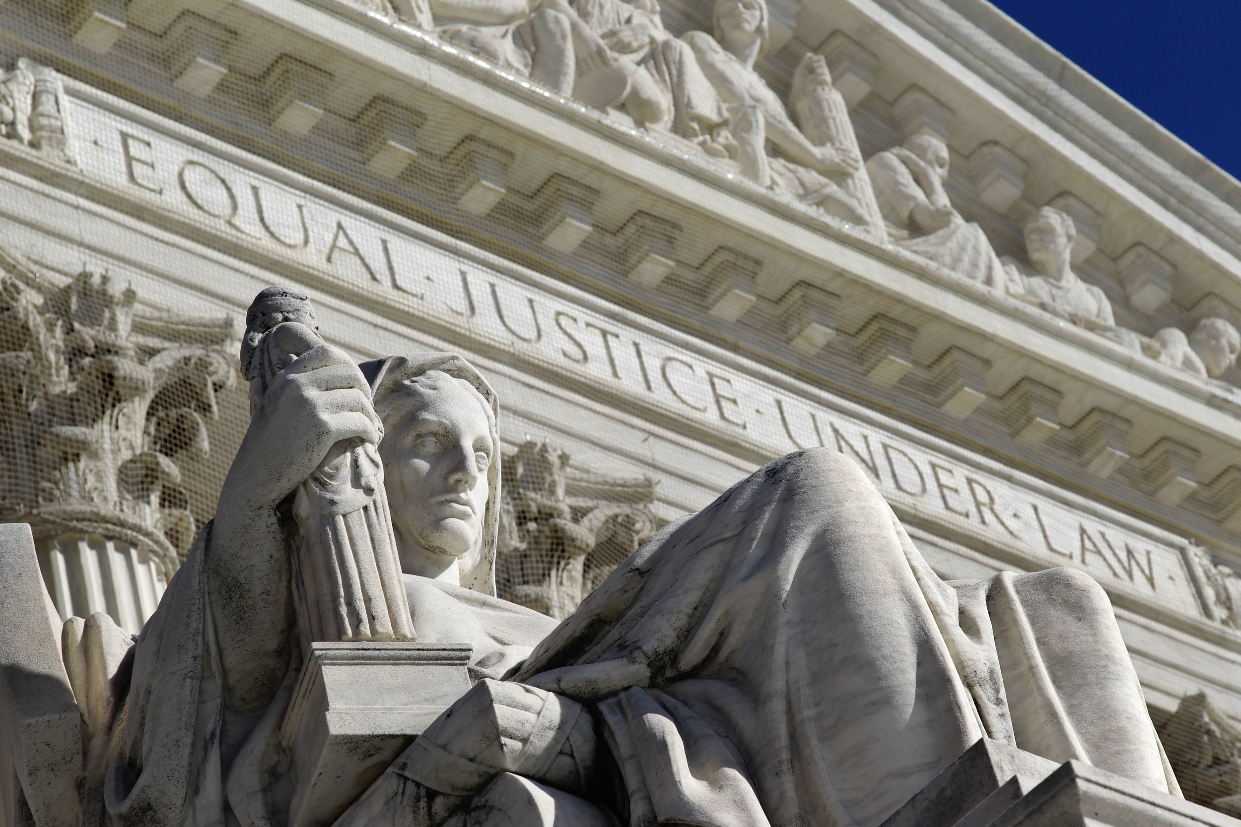 website 02 supreme court girl statue.jpg