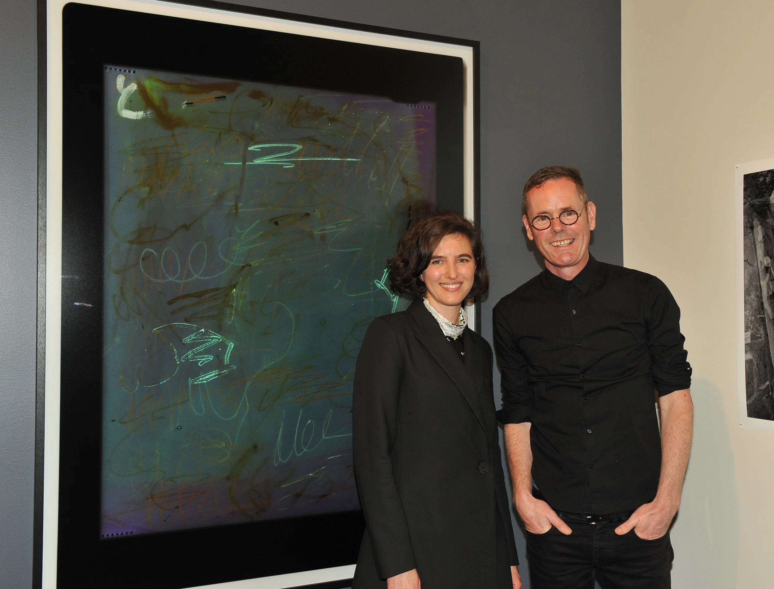 Winning photographer Justine Varga and 2017 judge Dr Shaune Lakin with overall prizewinner, Maternal Lines .